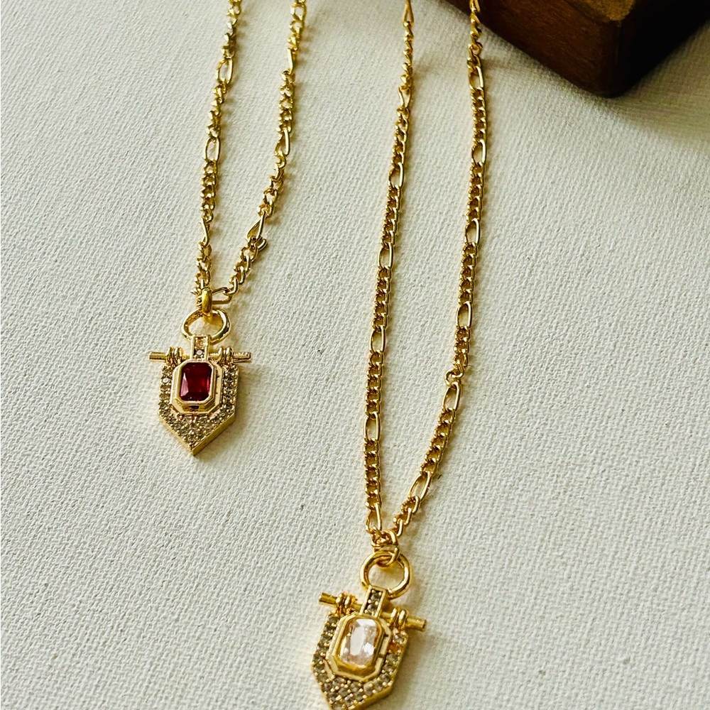 Elegant Gold Pendant Necklace with Red and White Accents